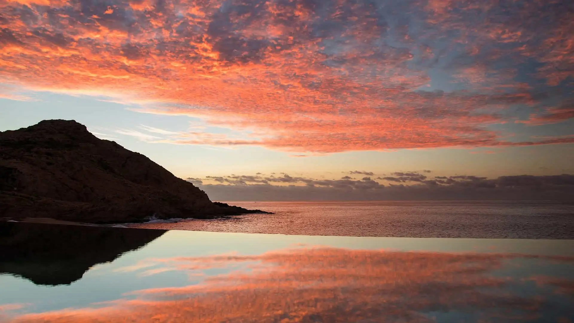Infinity pool at sunset
