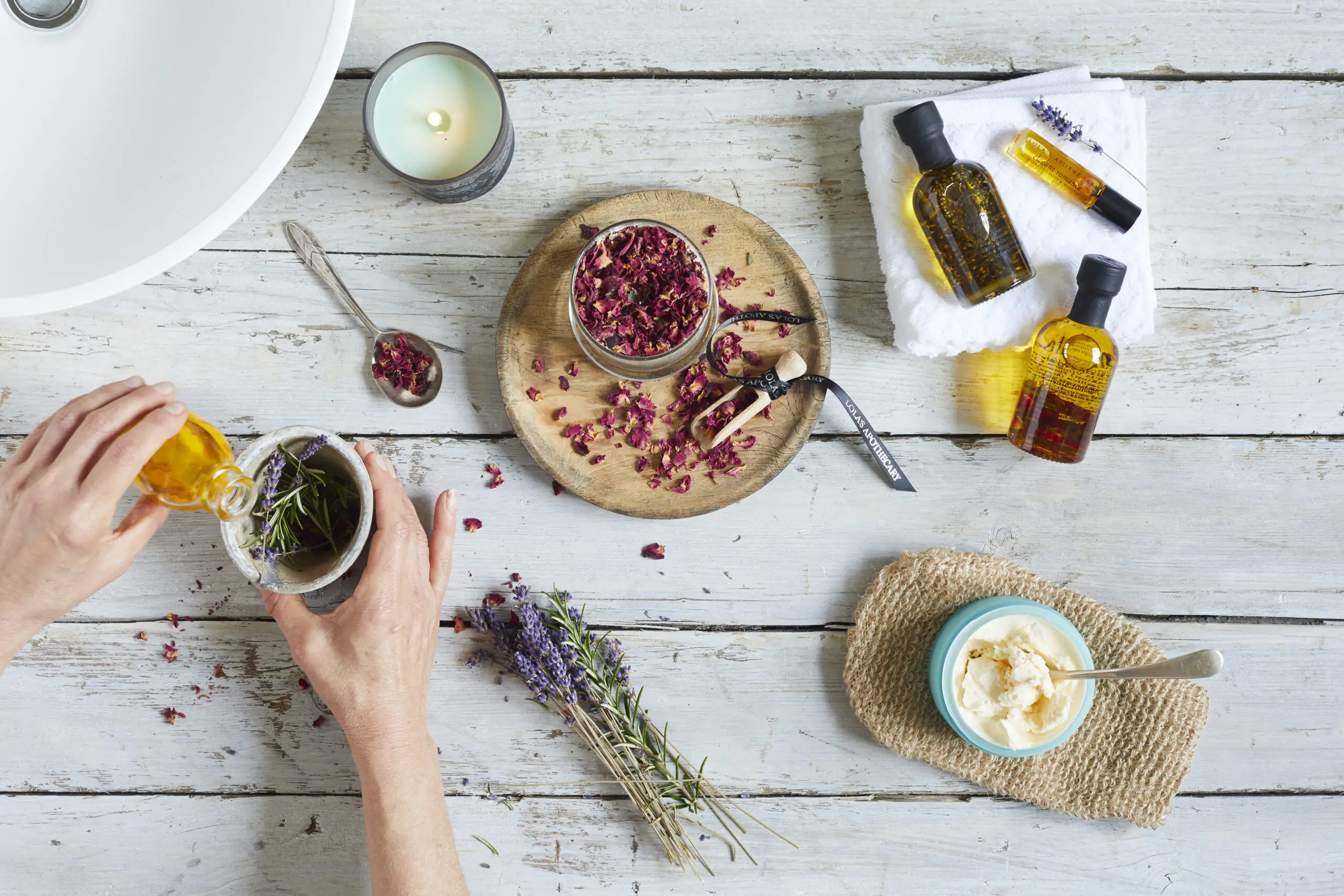 A person making essential oils