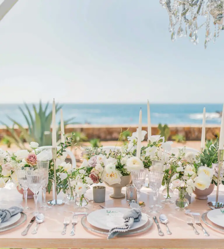 A dining table outside at a wedding at Montage Los Cabos