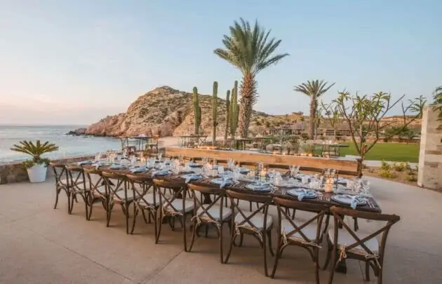 A table set up for a formal dinner at Marea by the ocean at Montage Los Cabos