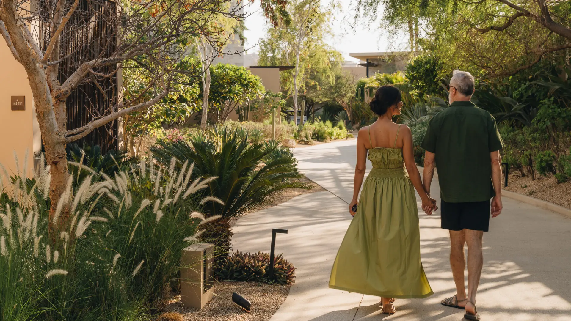 A couple walking on the grounds of Montage Los  Cabos.