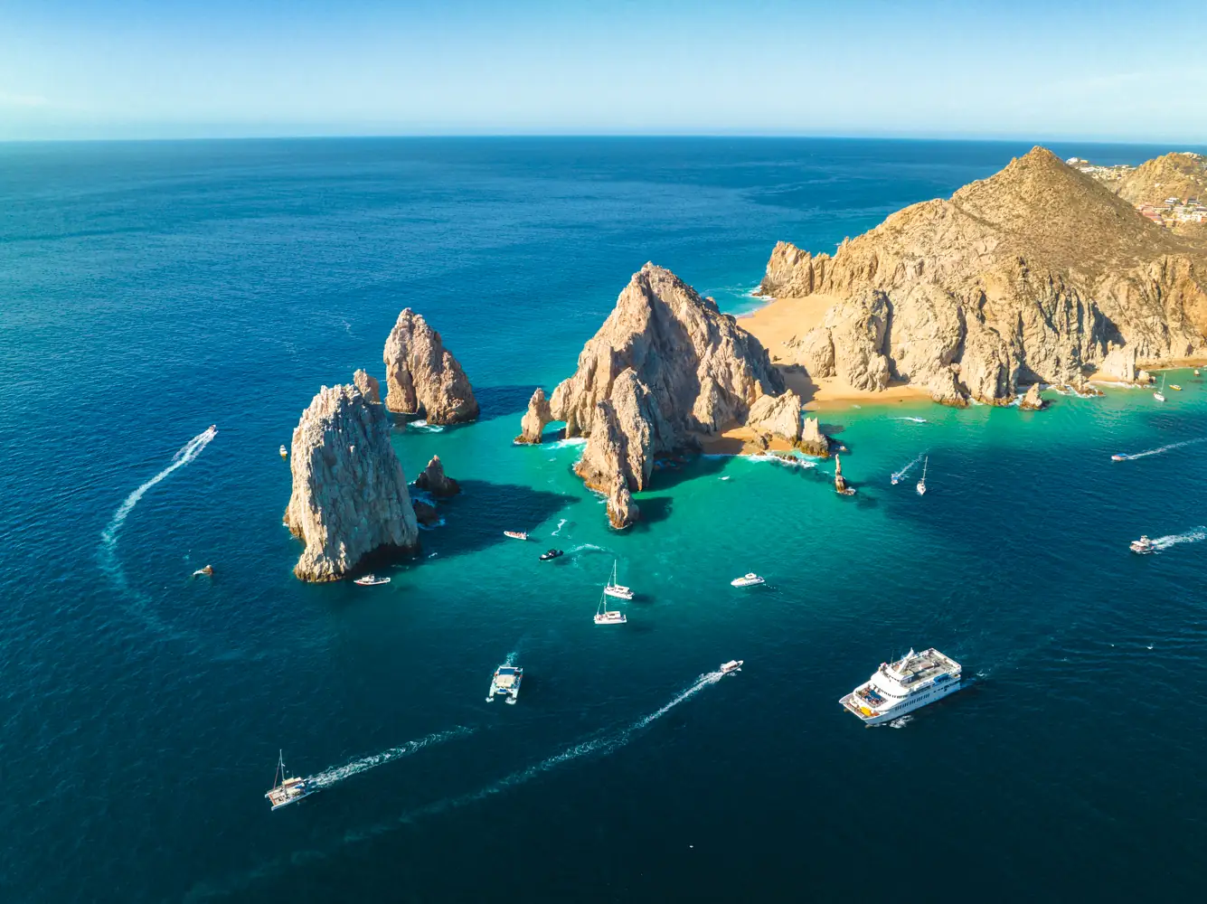 Boats at arch in Los Cabos