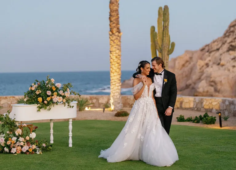 Happy couple by santa maria bay at Montage Los Cabos