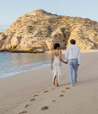 A couple walking on the beach
