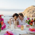 couple sitting at outdoor table