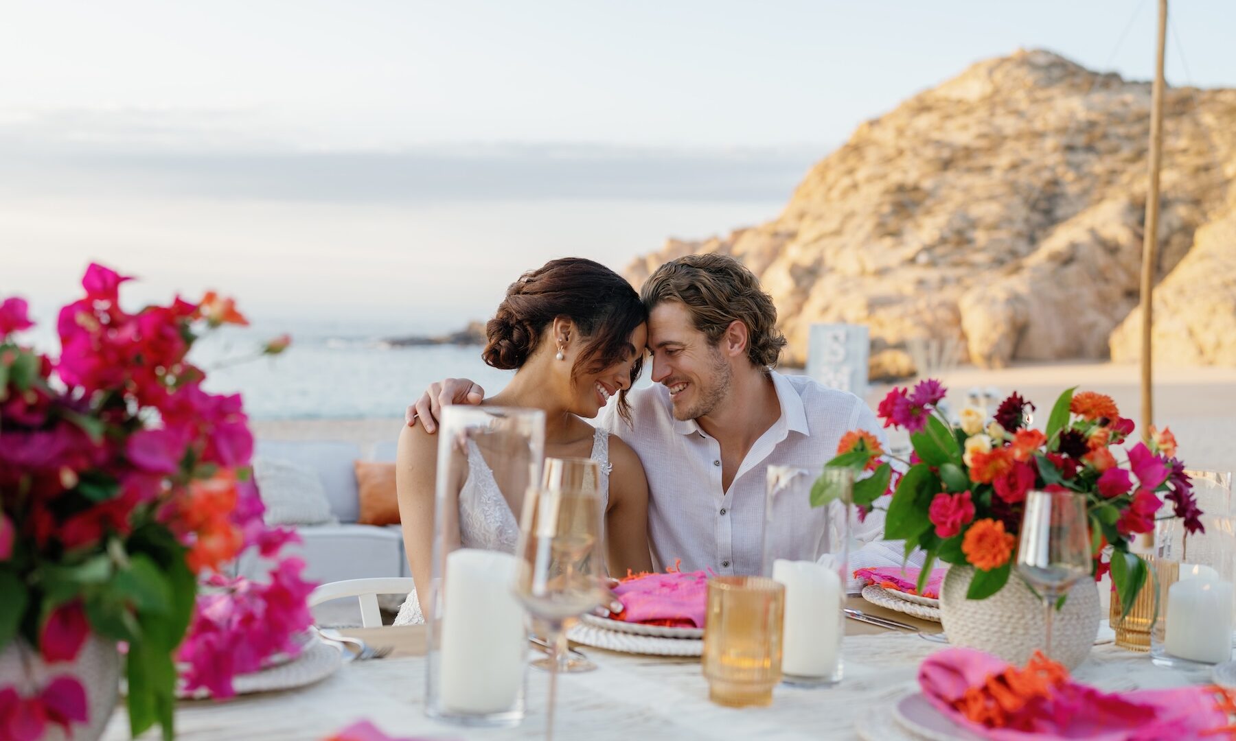 couple sitting at outdoor table