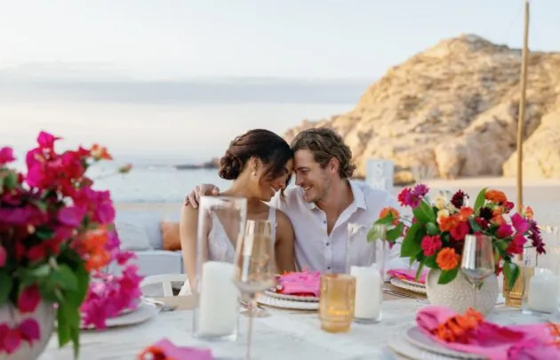 couple sitting at outdoor table