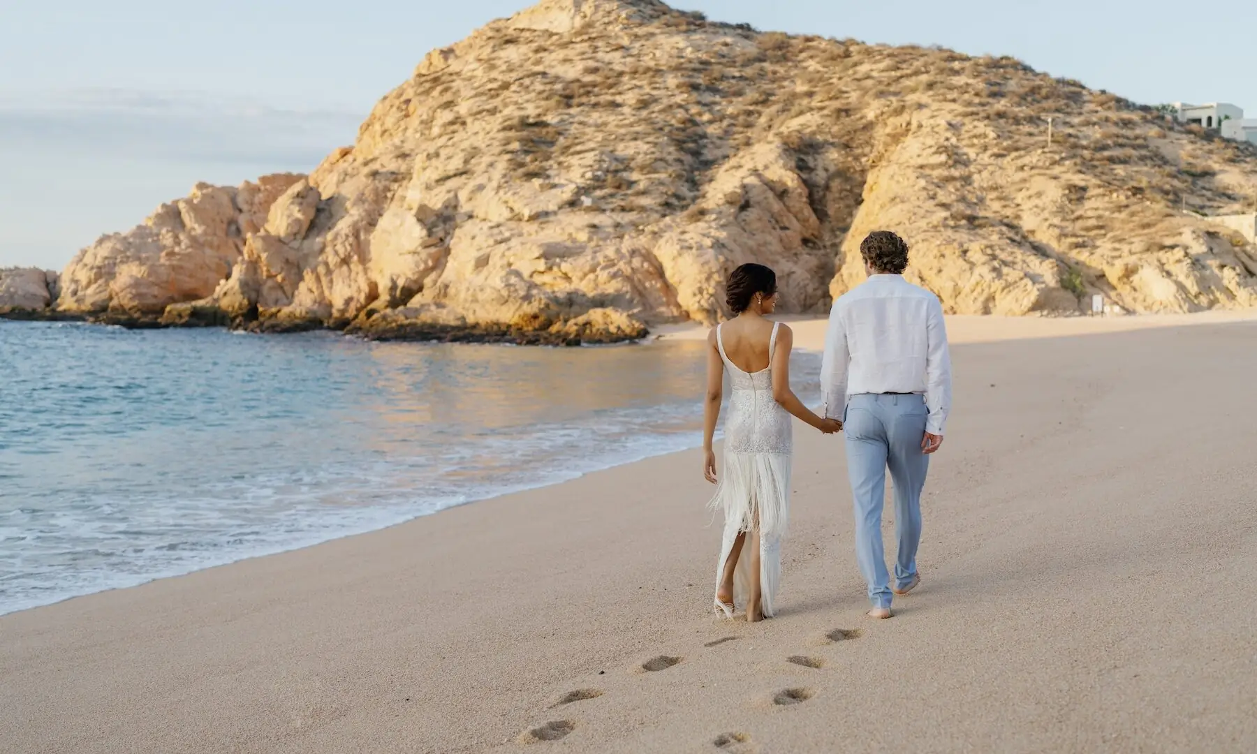 couple walking on beach