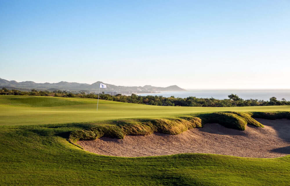 Golf green with sand bunker