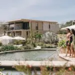 a couple getting into the pool