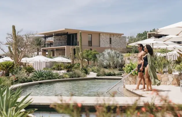 a couple getting into the pool