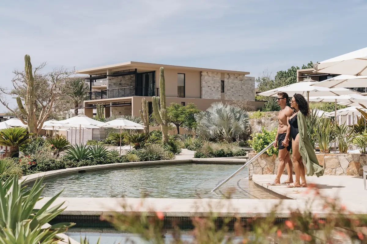 a couple getting into the pool