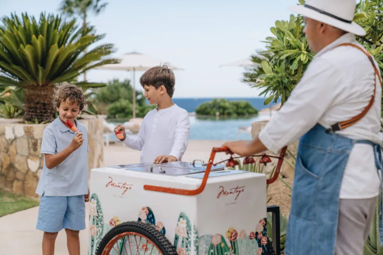 Children enjoying popsicles at Montage Los Cabos.