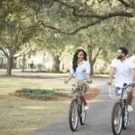 Couple biking in Palmetto Bluff