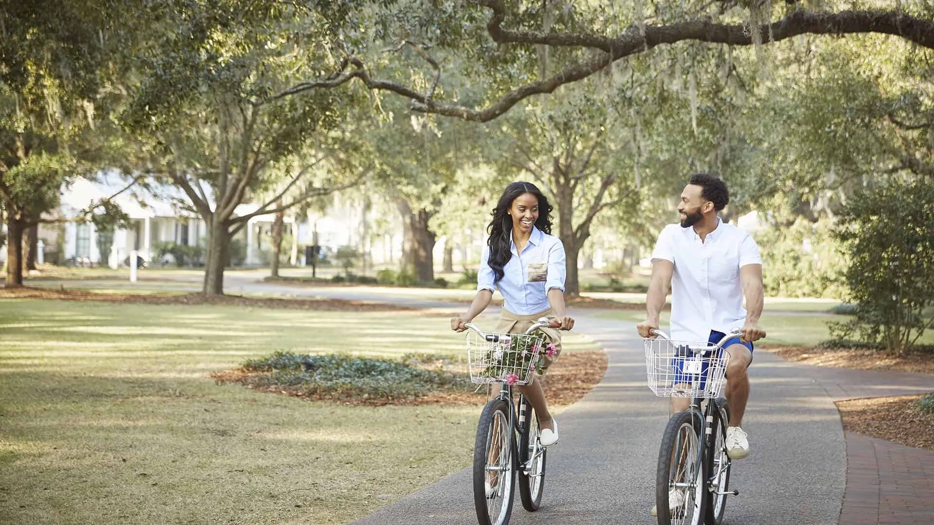 Couple biking in Palmetto Bluff