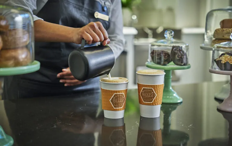 Hand Pouring Coffee at Buzz at Montage Palmetto Bluff