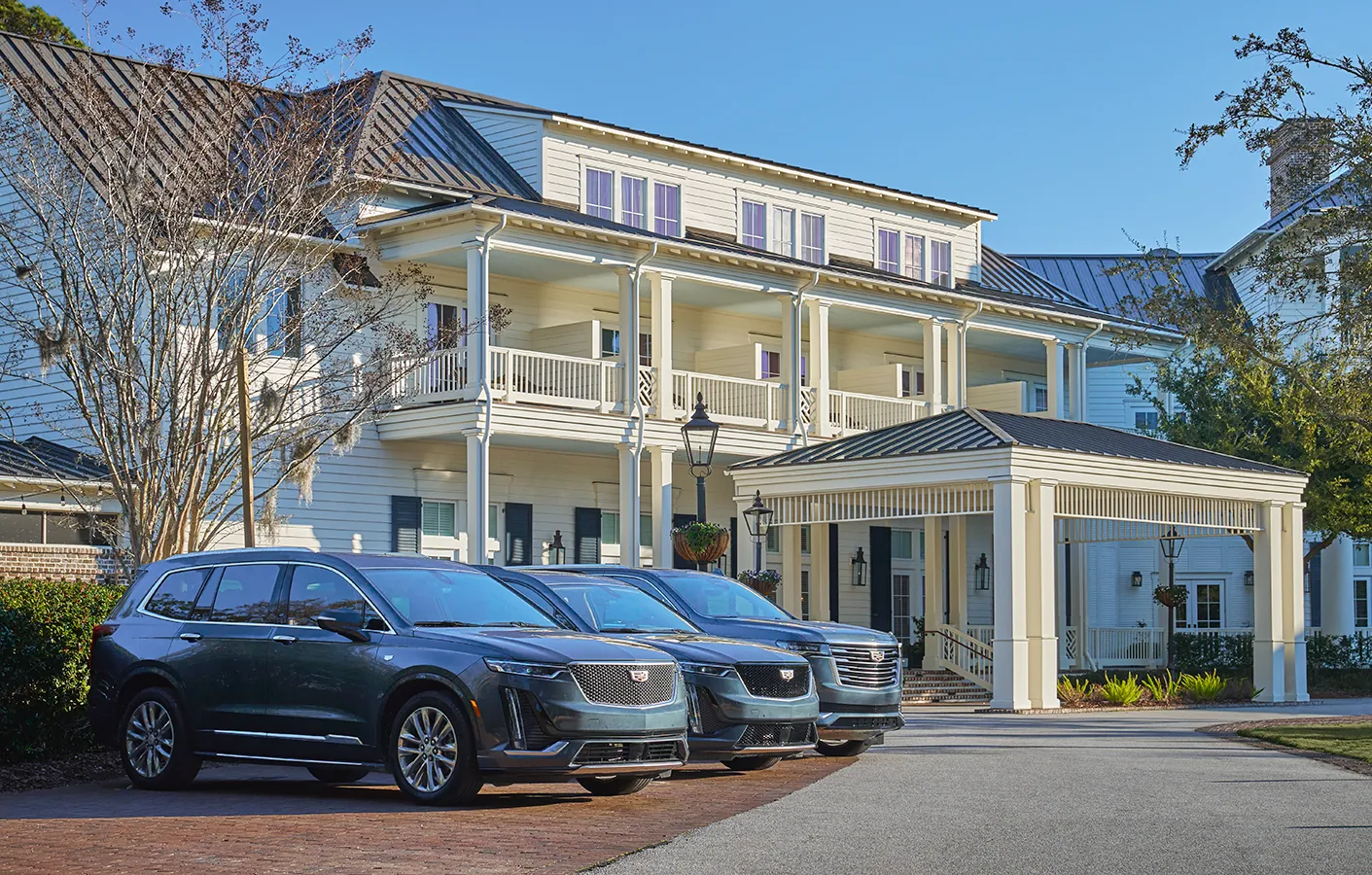 Three Cadillacs outside Montage Palmetto Bluff