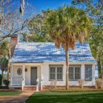 Image of a white cottage at Montage Palmetto Bluff