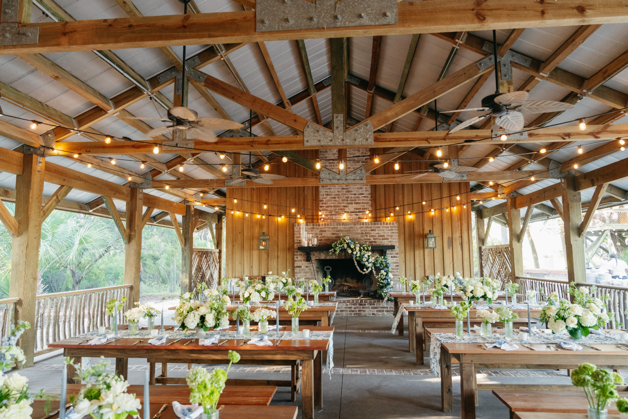 Wedding reception set up under outdoor pavilion at Moreland Landing