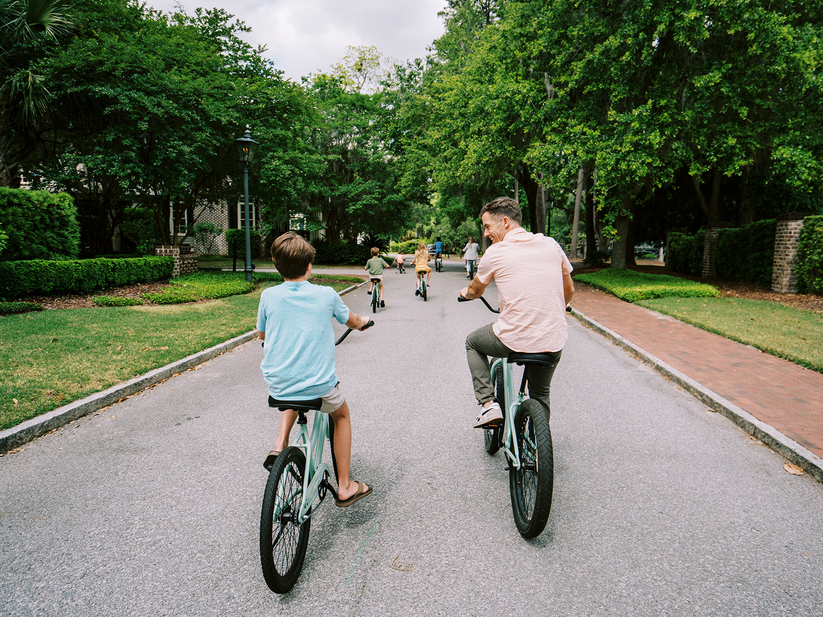 Father and child biking