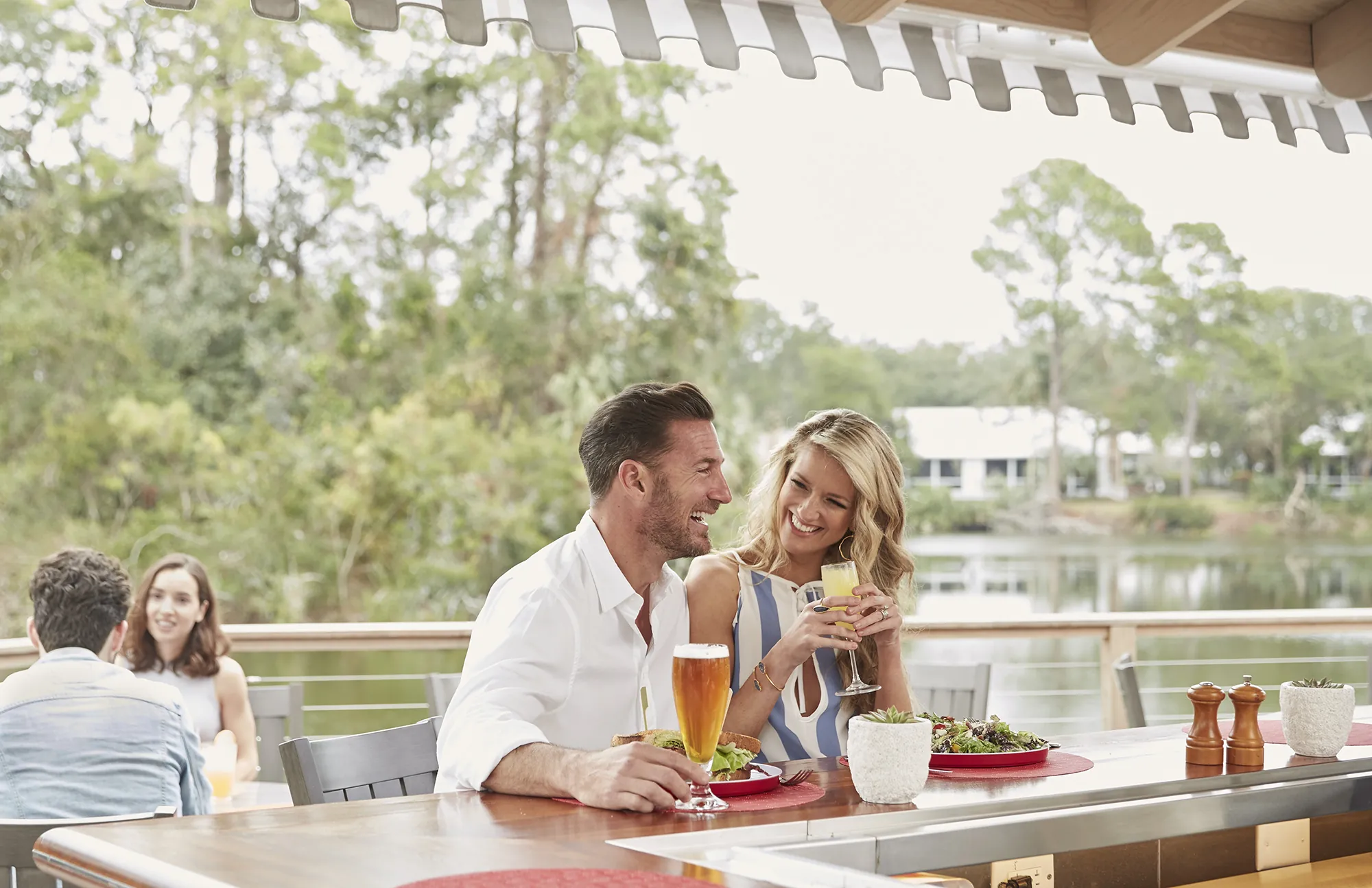 A couple having a drink at Fore & Art
