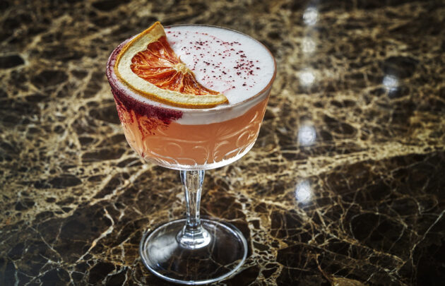 A pink cocktail at Hush on the Bluff