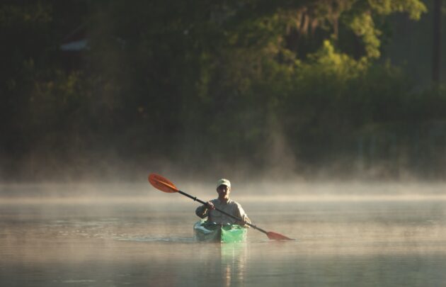 Kayaker on lake