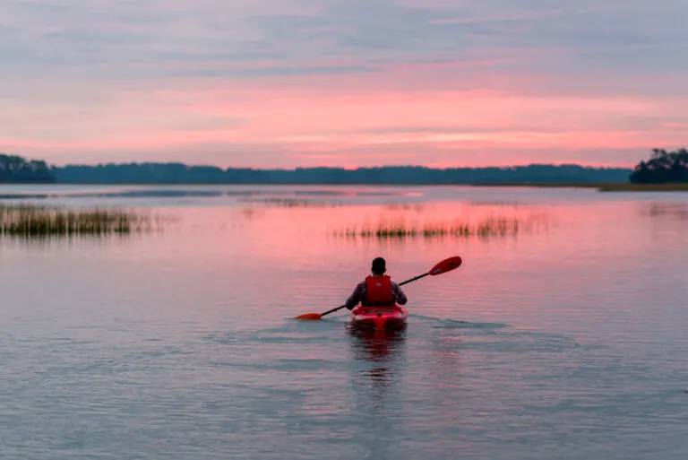 Person kayaking on May River